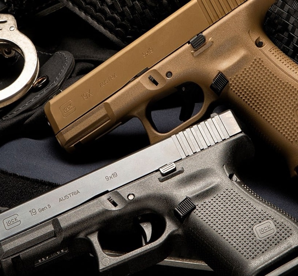 GLOCK Blue Label Program | Apocalypse Sports Tan GLOCK 19X and black GLOCK 19 Gen5 pistols